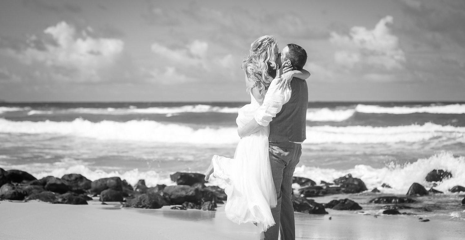 Bride and Groom sharing an intimate moment after their beautiful  beach elopement